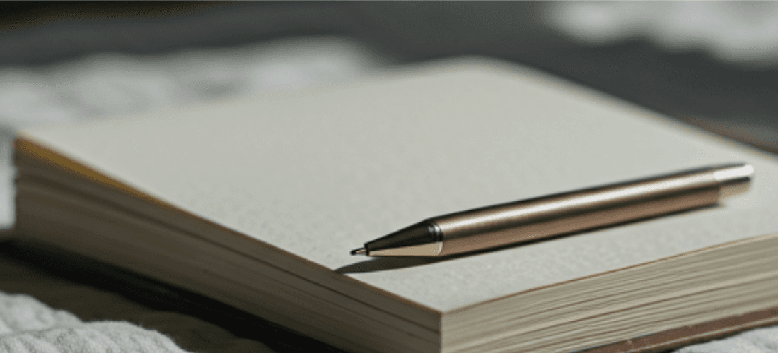 Open journal and pen for the Marynating Workbook